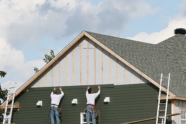 Professional Vinyl Siding technician working in Pendleton, IN